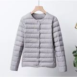 Chaqueta de plumas para mujer – Corte entallado – Ultraligera – Acolchada con botones – Largo hasta la cadera