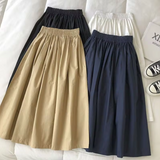 Falda midi de mujer – Cintura alta – Corte holgado y fluido – Tejido transpirable – Cintura elástica