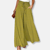 Pantalón ancho de mujer – Corte holgado – Tejido transpirable – Cintura con cordón – Bolsillos laterales