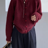 Cárdigan oversize con botones en forma de corazón y cuello redondo