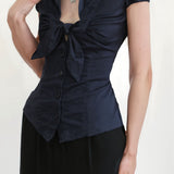 Blusa preppy con pajarita y botones para ir al trabajo