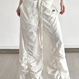 Pantalones cargo blancos de pierna ancha con cordón