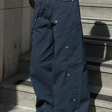 Pantalones cargo de pierna ancha con cintura baja y abertura con tachuelas