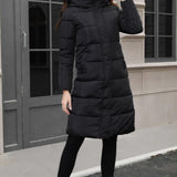 Chaqueta acolchada larga con capucha de talla grande
