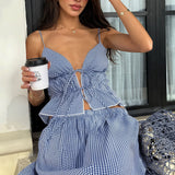 Conjunto de top corto con cuello halter y falda de vendaje con cordones
