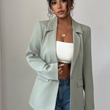 Blazer minimalista de manga larga