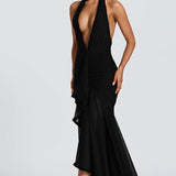 Vestido de noche sexy de sirena con escote pronunciado y espalda abierta.