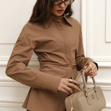 Blusa vintage de algodón con cintura fruncida y corte ajustado