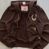 Sudadera vintage con remaches y cremallera.