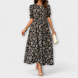 Amelia - Vestido con escote redondo y patrón floral