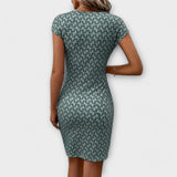 Emma - Vestido de manga corta en forma de tulipán con estampado integral