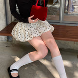 Minifalda retro de lunares con corte A y cintura elástica