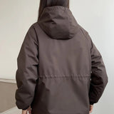 Chaqueta impermeable con capucha y cordón, corte holgado, informal, para senderismo al aire libre.