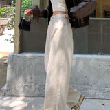 Ellen - Pantalones modernos, de pierna ancha y cintura alta.