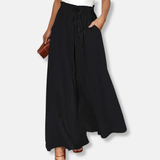 Pantalón ancho de mujer – Corte holgado – Tejido transpirable – Cintura con cordón – Bolsillos laterales
