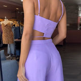 Conjunto de mujer: Top asimétrico de tirantes y pantalón de cintura alta y ancha