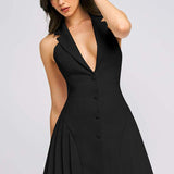 Minivestido con cuello blazer, espalda abierta, escote pronunciado y volantes
