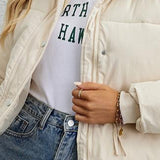 Chaqueta acolchada con cuello alto corto