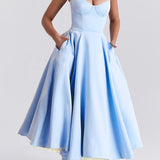 Vestido de noche largo con escote en pico y detalles abullonados