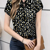 Blusa chic con lunares negros y dorados: elegante, divertida y versátil para mujer.