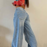 Vaqueros vintage de cintura alta, corte recto y holgado.