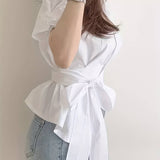 Kasi - Blusa elegante con mangas abullonadas