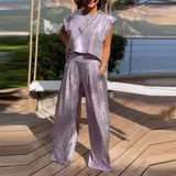 Conjunto de dos piezas para mujer: Top corto sin mangas, pantalón de cintura alta y ancho, tejido satinado.