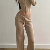 Conjunto sexy de dos piezas de malla, ajustado y abotonado, con mangas largas y cintura baja.