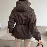 Chaqueta impermeable con capucha y cordón, corte holgado, informal, para senderismo al aire libre.