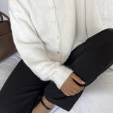 Chaleco vintage de punto gris claro con botones de concha