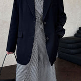 Blazer con espalda abierta y corte relajado