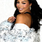 Abrigo entallado con cuello largo de piel con estampado de leopardo