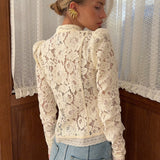 Blusa vintage de encaje con botones al frente