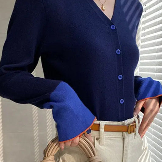 Chaleco de punto con bloques de color, mangas acampanadas y cuello en V