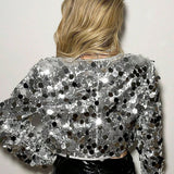 Abrigo de moda con lentejuelas plateadas