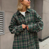 Blusa de cuadros de largo medio con bolsillos dobles