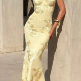Vestido largo sin tirantes bordado con flores