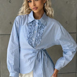 Blusa de rayas con volantes y cintura anudada