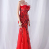 Vestido de noche con lentejuelas y plumas de avestruz