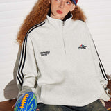 Sudadera retro con media cremallera y cuello alto