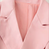 Blazer rosa con botones