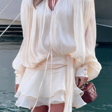 Vestido corto de gasa con mangas farol y volantes