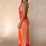 Vestido largo elegante y sexy con escote pronunciado y paneles de encaje transparente.