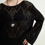 Blusa de punto jacquard con estampado de rombos