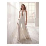 Mono de mujer – Tejido fluido de lujo – Corte elegante – Escote halter – Pierna ancha