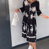 Katia - Vestido de diseñador con estampado floral y mangas 3/4