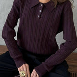 Blusa holgada con cuello polo jacquard y mangas largas.
