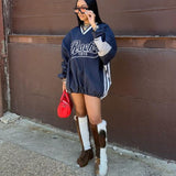 Sudadera de punto deportiva y holgada con cuello en V.