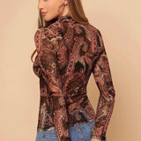 Blusa de punto de manga larga con cuello alto y estampado paisley
