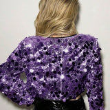 Abrigo de moda con lentejuelas plateadas